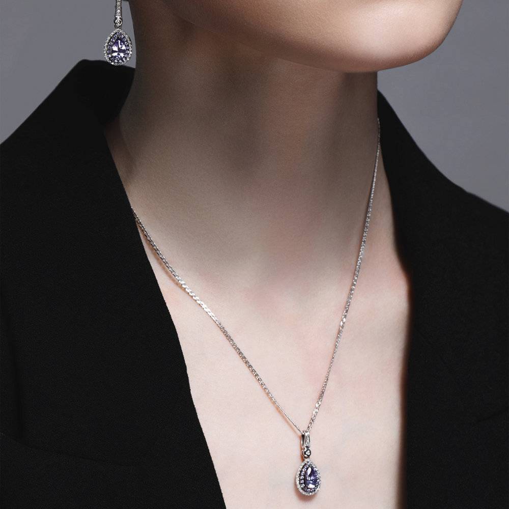 Серьги из белого золота с бриллиантами и танзанитами (046784)